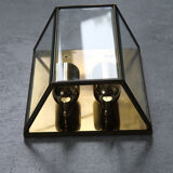 Wall sconce in brass and glass