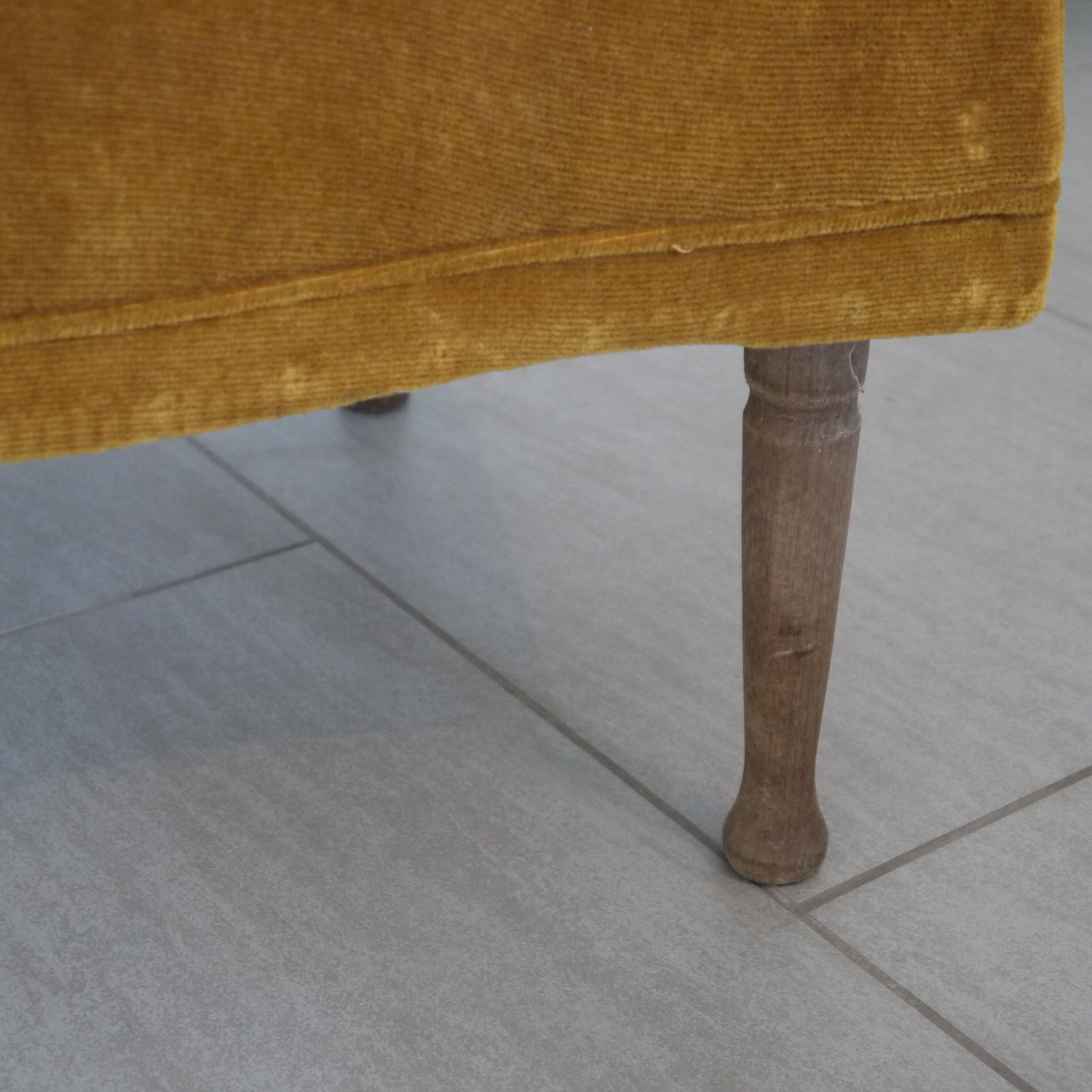 Yellow velvet padded toad armchair
