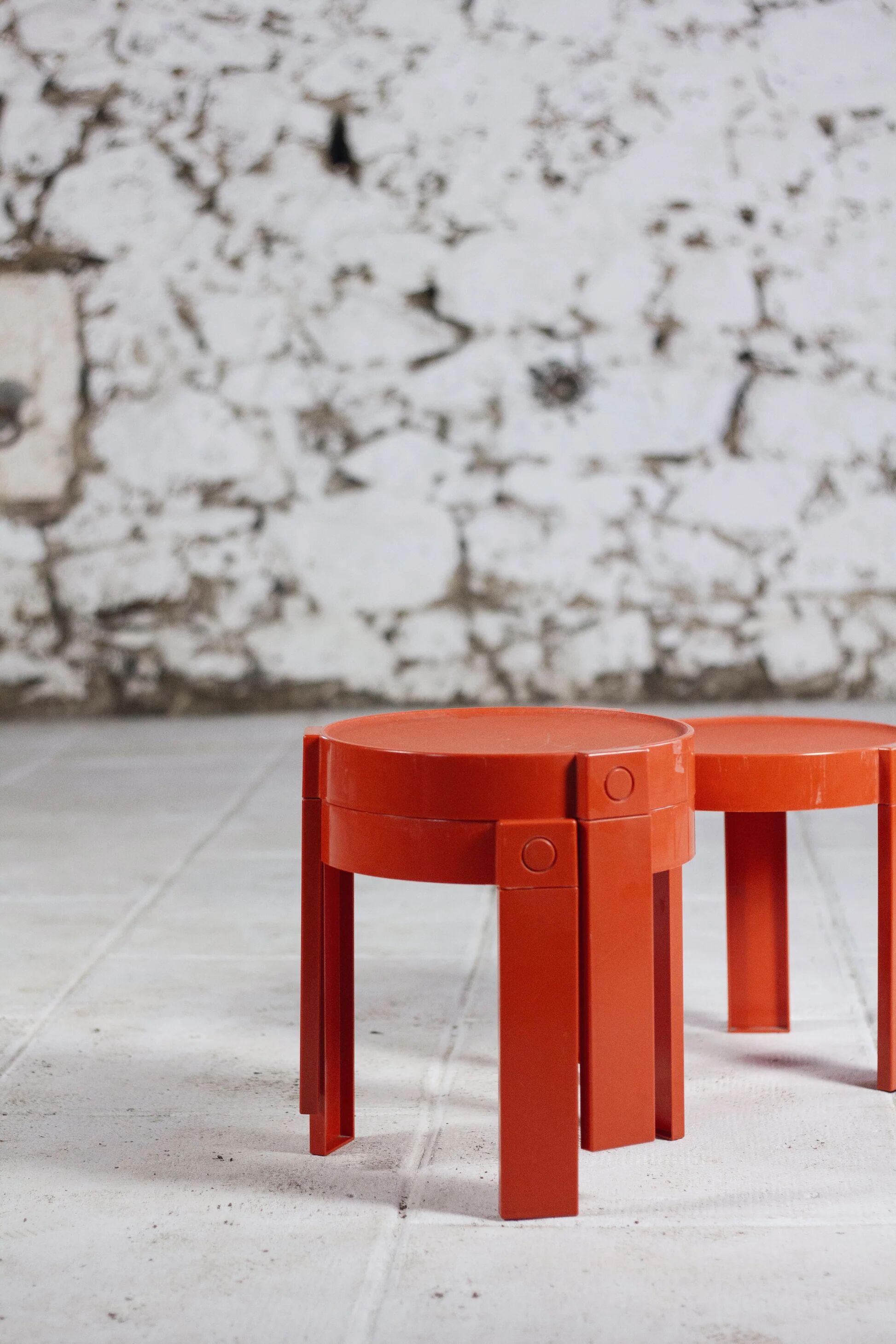 3 nesting tables in orange plastic by Prisunic, 1970.