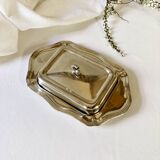 Old silver metal butter dish with fish lid
