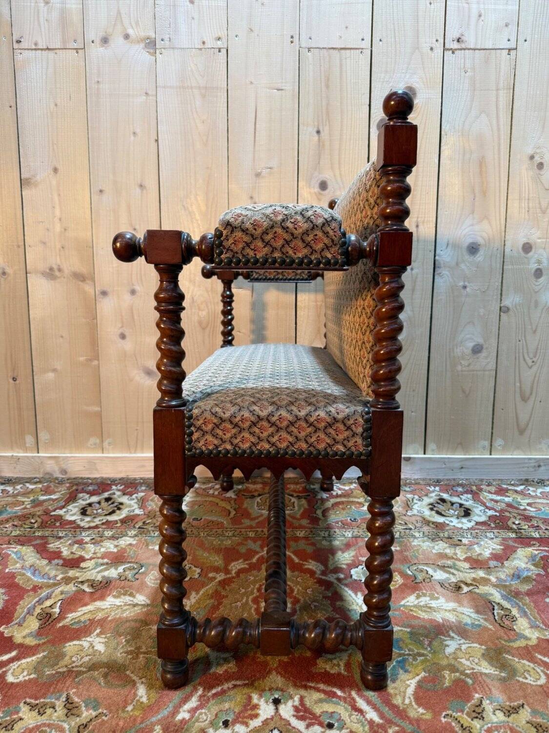 Small office bench in mahogany in the Louis XIII style.