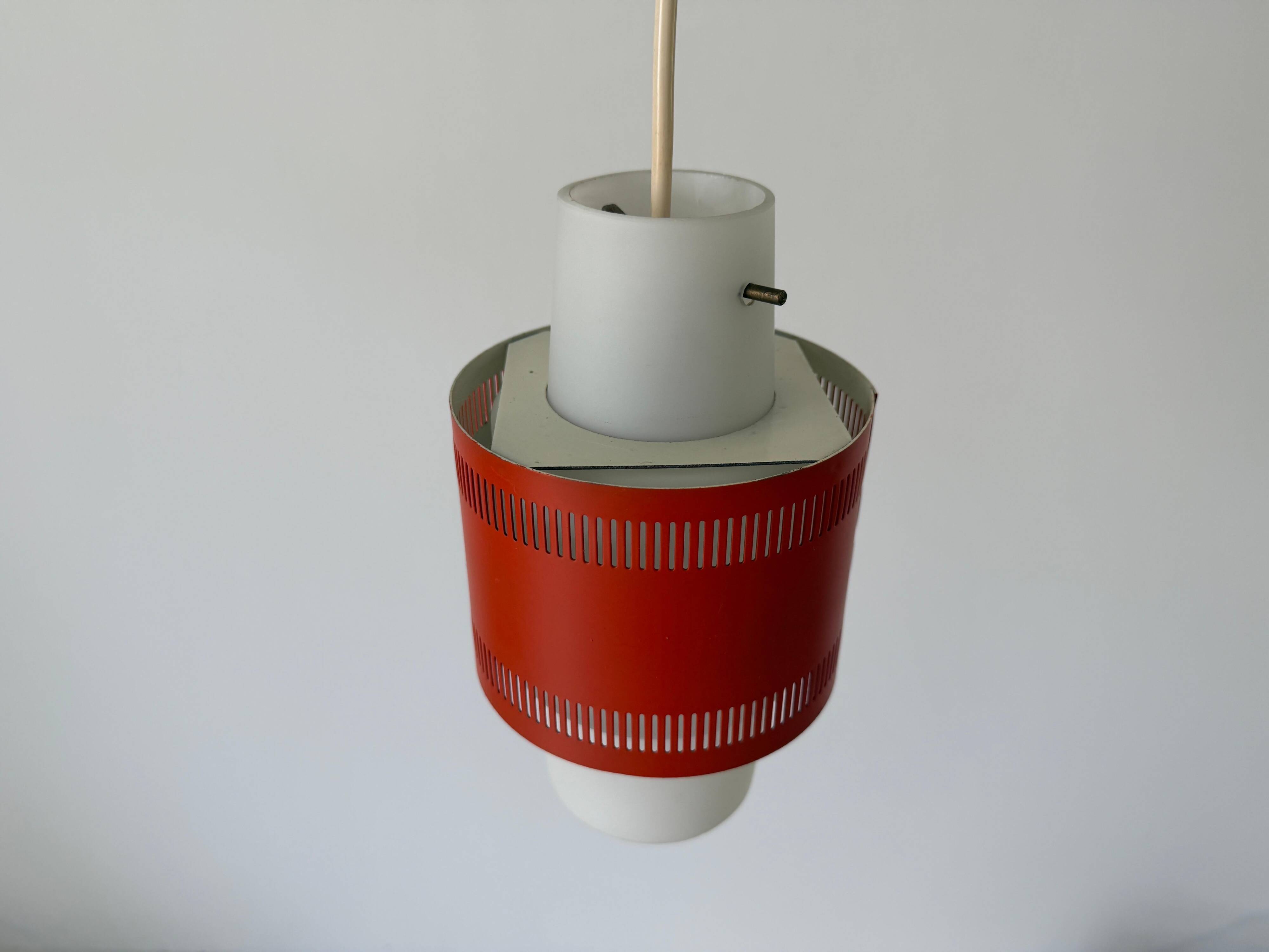 Glass ceiling light with an orange metal frame, 1960s, Germany.