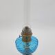 Lampe à huile en verre bleu et laiton