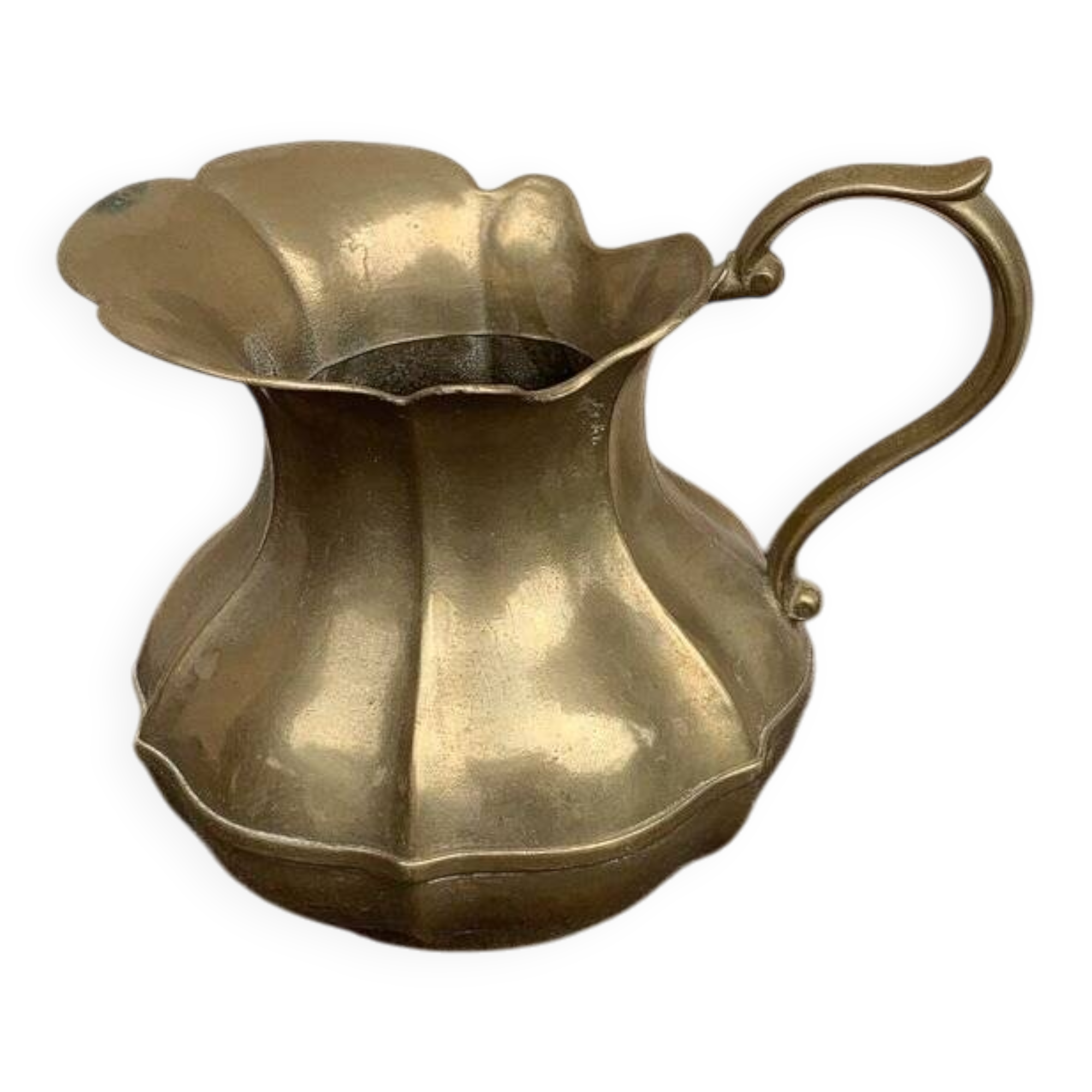 Vintage brass pitcher with "petal" patterns — decorative S-shaped handle, 1950s.