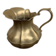Vintage brass pitcher with "petal" patterns — decorative S-shaped handle, 1950s.