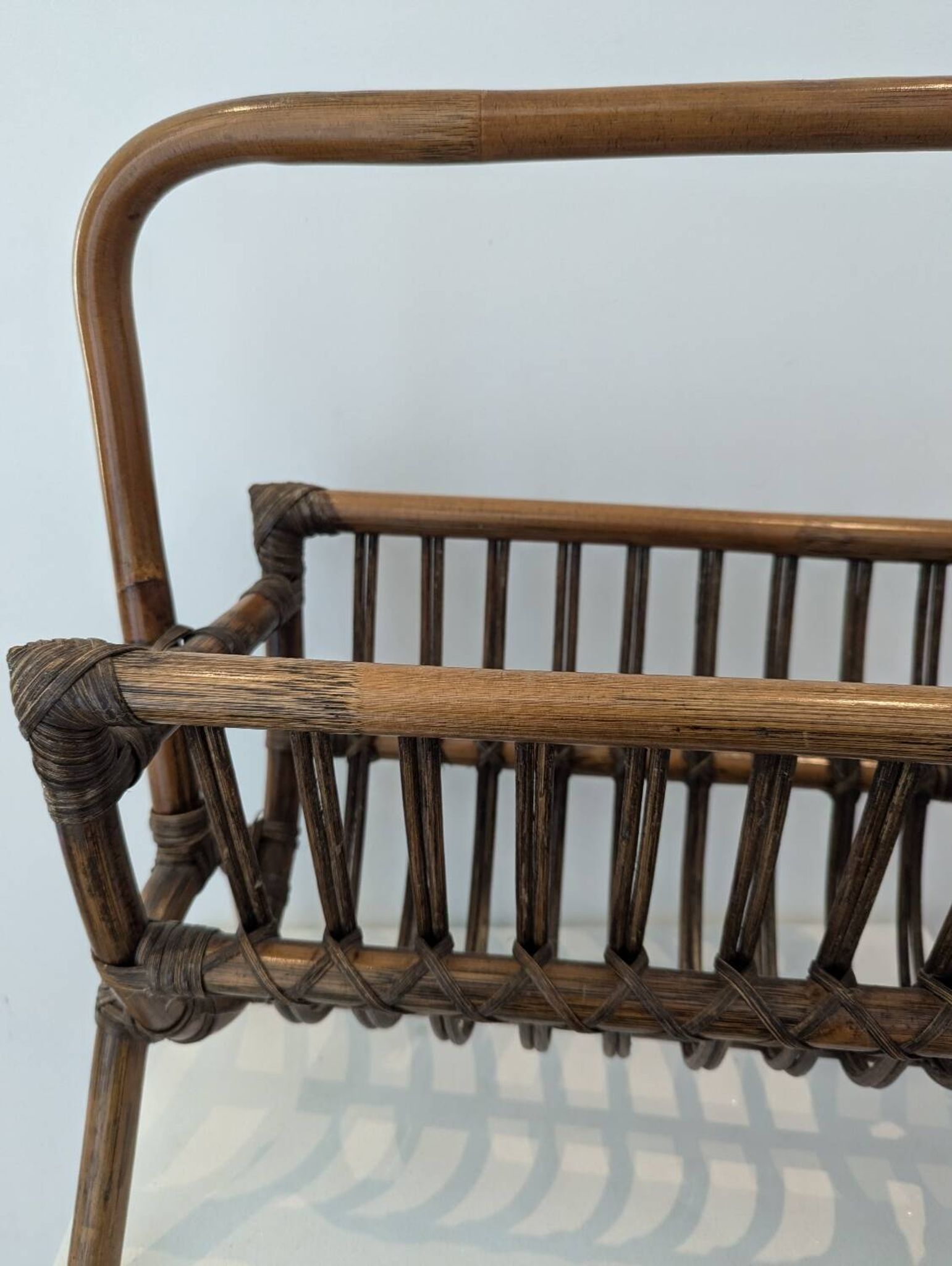 Vintage rattan magazine rack