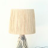 White and blue ceramic lamp, raffia shade