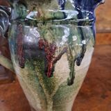 Enameled stoneware pitcher signed