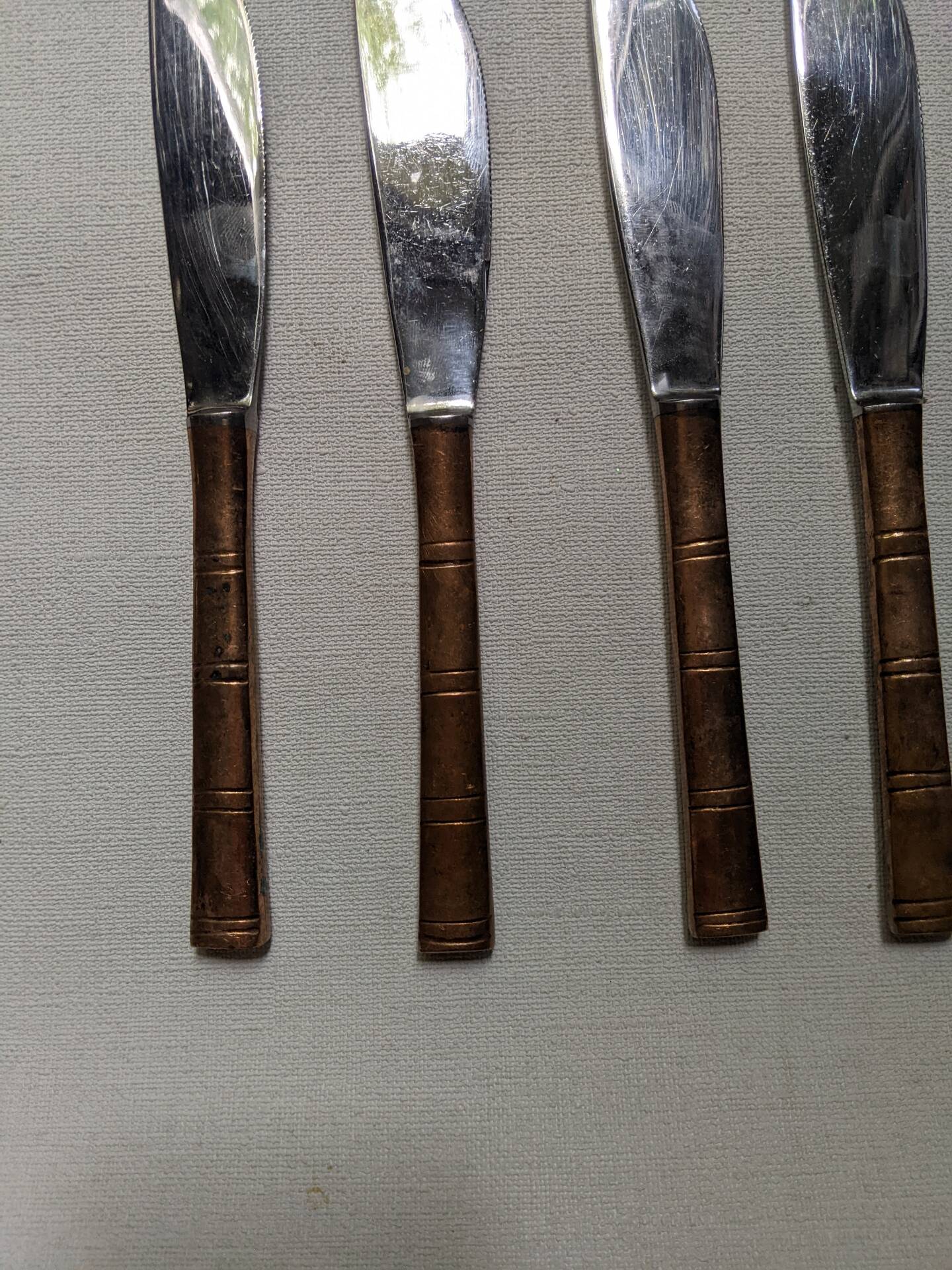 Set of 12 bamboo-style dessert knives in brass.