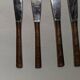 Set of 12 bamboo-style dessert knives in brass.