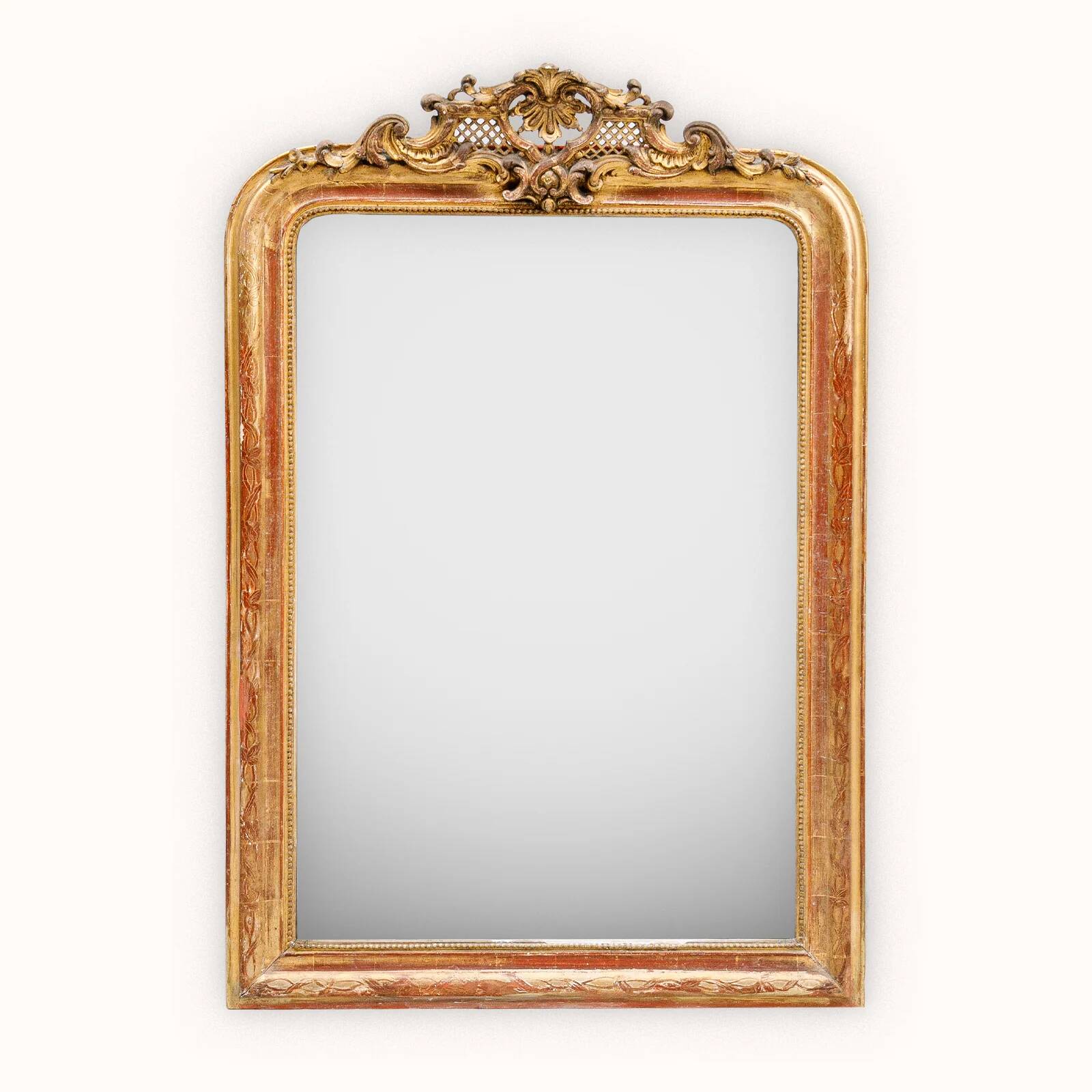 19th-century Louis-Philippe mirror with patina and pediment.
