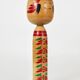 Decorative Togatta Kokeshi doll sculpture from northern Japan, hand-painted.