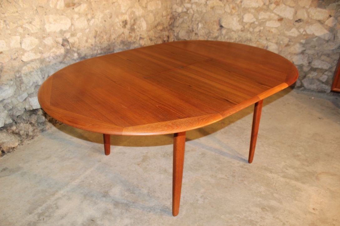 Scandinavian vintage teak dining table with 2 extension cords hidden by Svend Aage Madsen for Knudsen - Son, Denmark