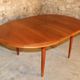 Scandinavian vintage teak dining table with 2 extension cords hidden by Svend Aage Madsen for Knudsen - Son, Denmark