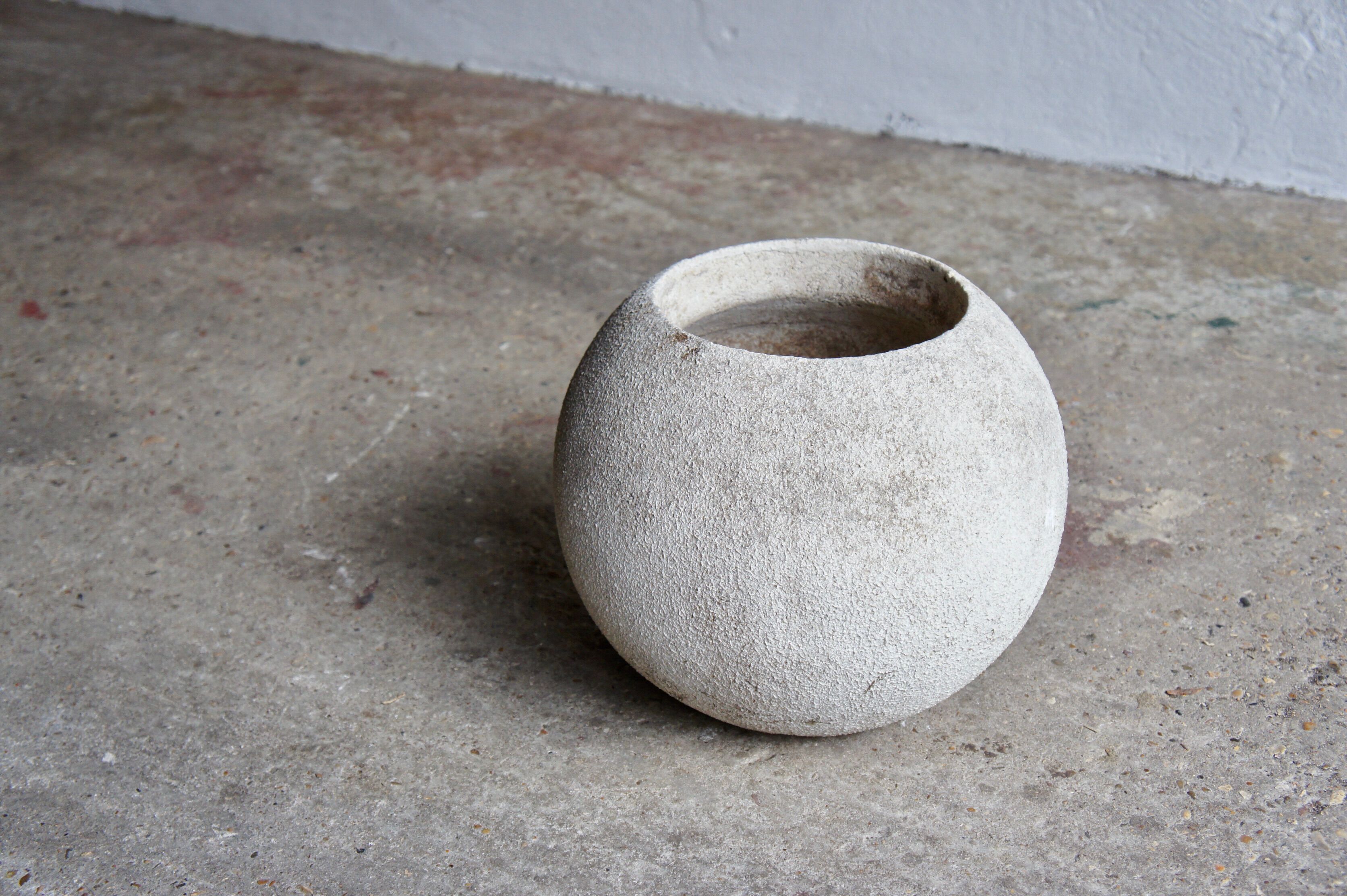Spherical concrete planter