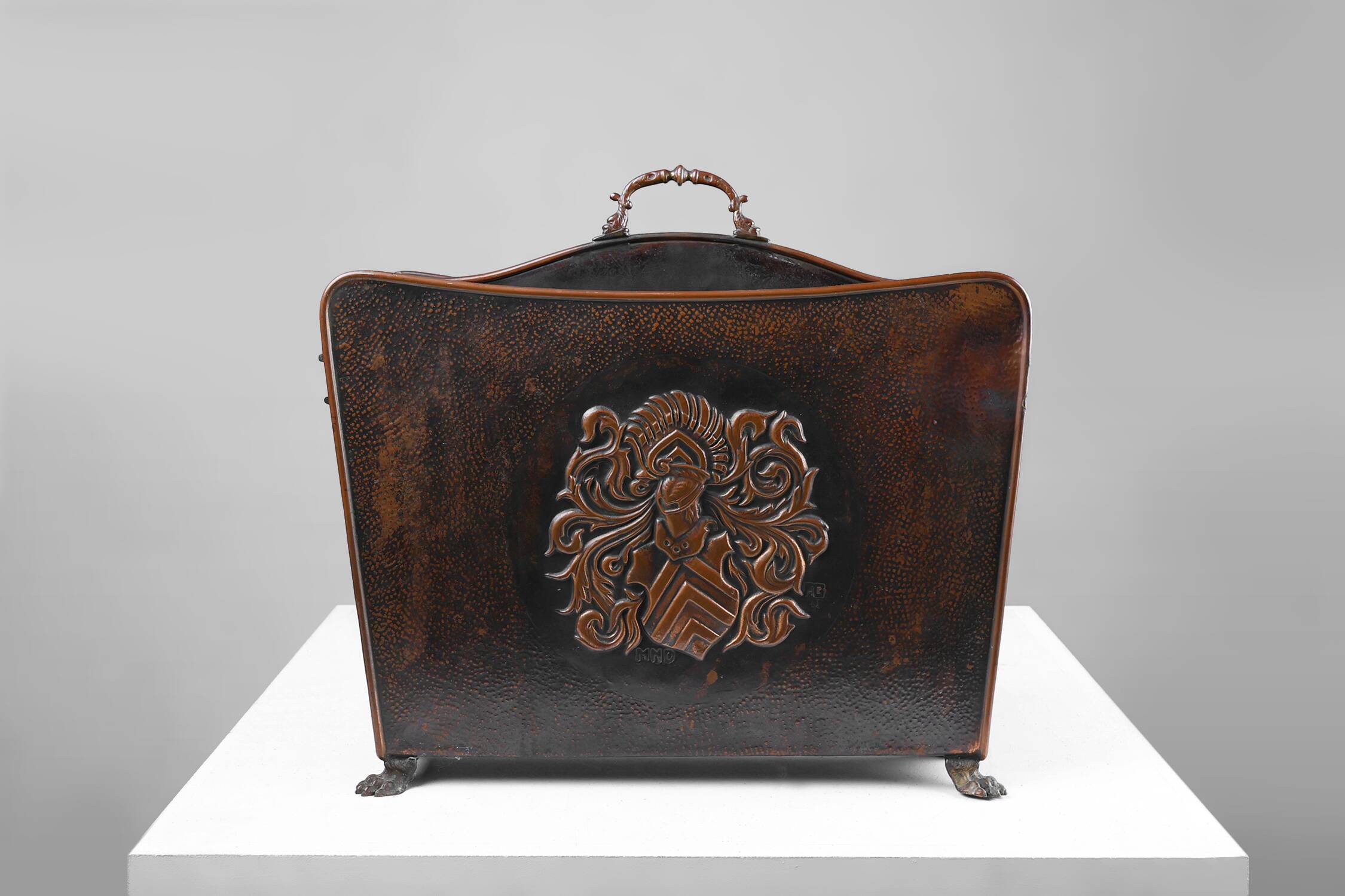 Mid-century magazine rack in hammered copper, France ca. 1900