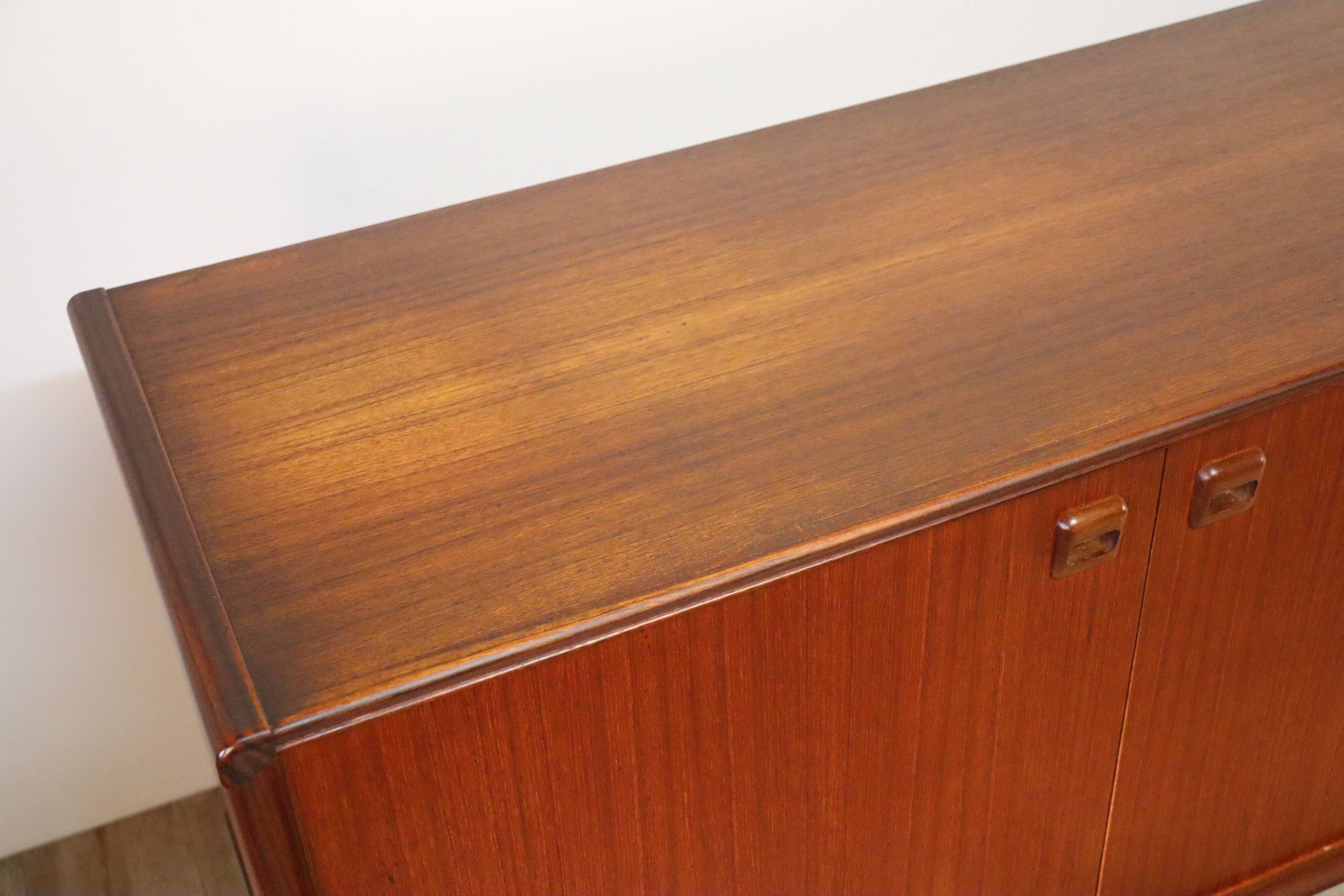 Scandinavian row in solid teak 1960