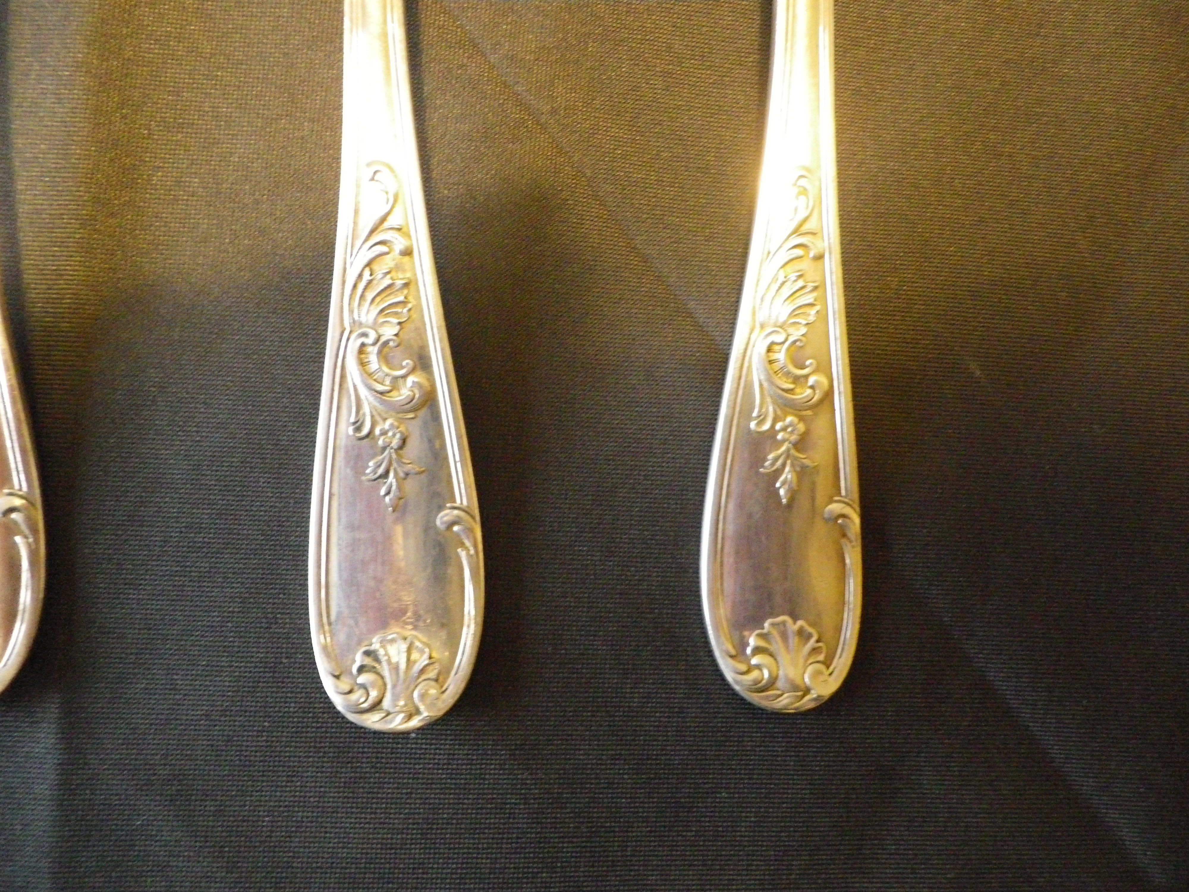 5 tablespoons in silver, 2 punches, fine decorations in relief