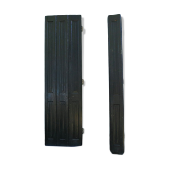 Pair of wooden shutters painted black