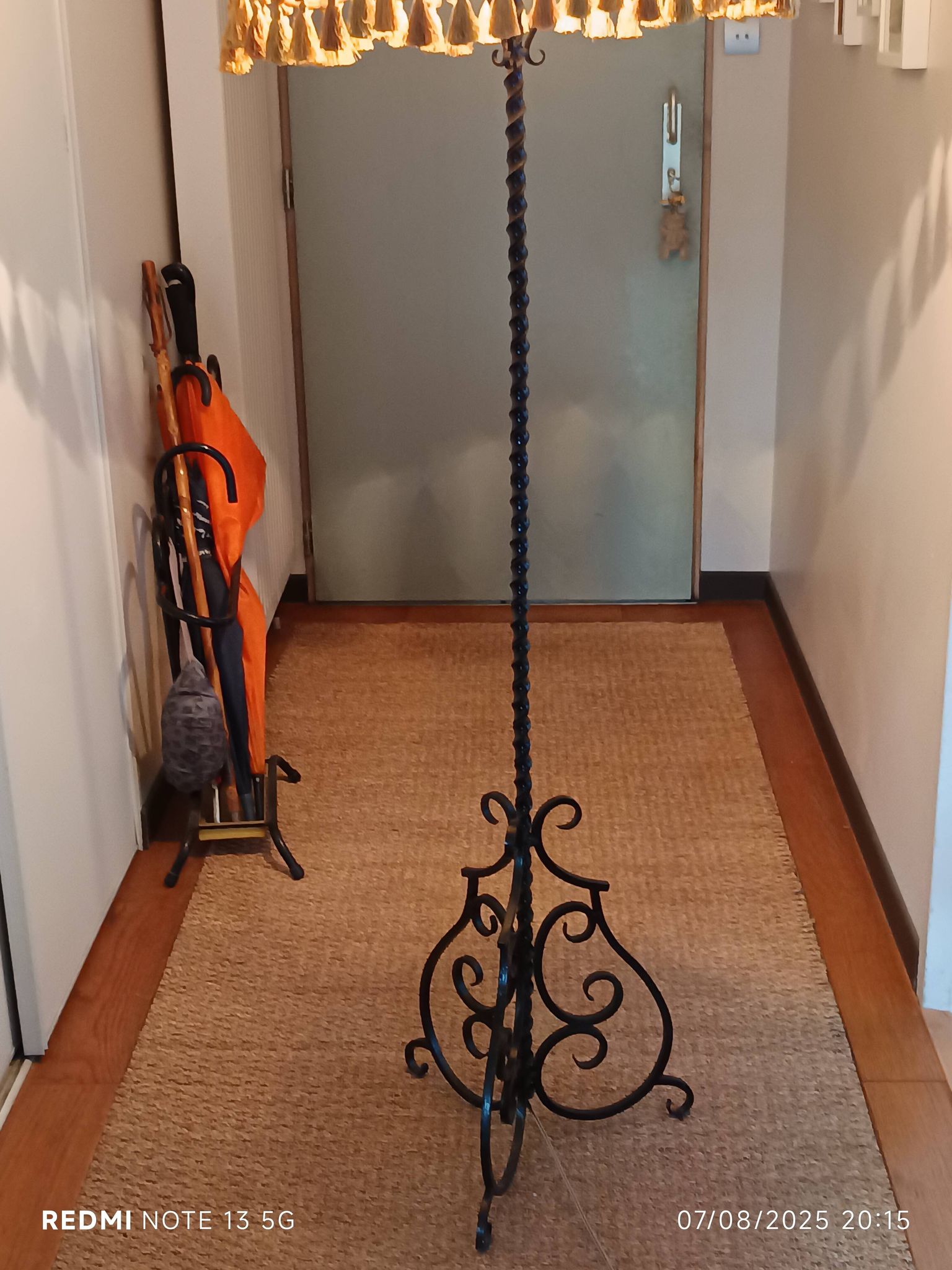 Black twisted iron lampstand with scrolled tripod base 1950/1960