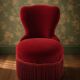 Vintage burgundy velvet armchair with fringes – theatrical and elegant