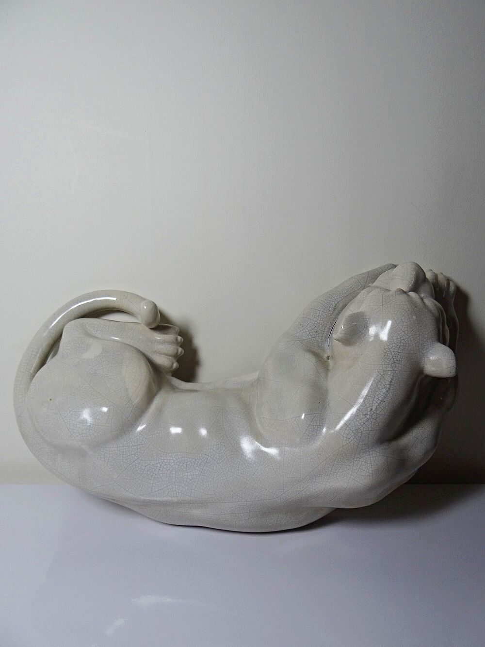Large elongated panther in crackled earthenware, vintage 1960s-1980s.