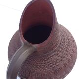 Pitcher in structured brown ceramic