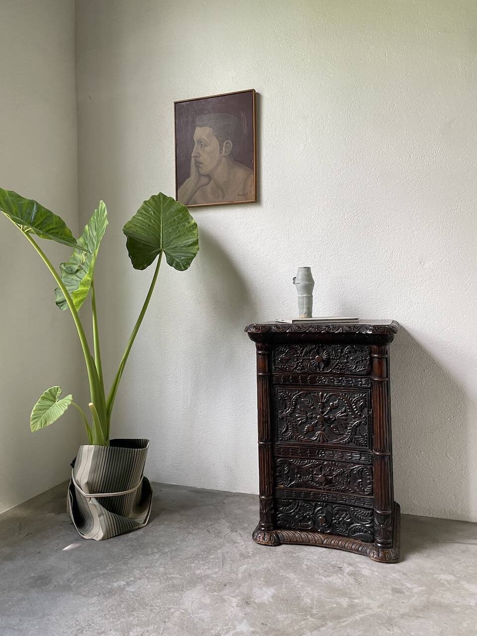 19th century chest of drawers in carved blackened pine