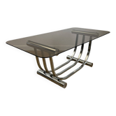 Smoked glass coffee table and chrome base by Yves Boutboul