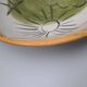 Vallauris 1950 Vintage cup with sun, star, and fish patterns.