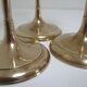 Trio of brass scandinavian candlesticks