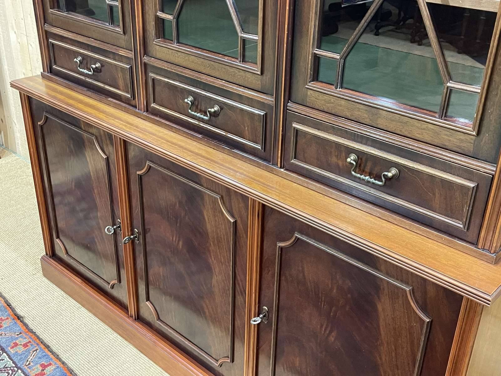 English two-piece mahogany bookcase, made in the 1970s
