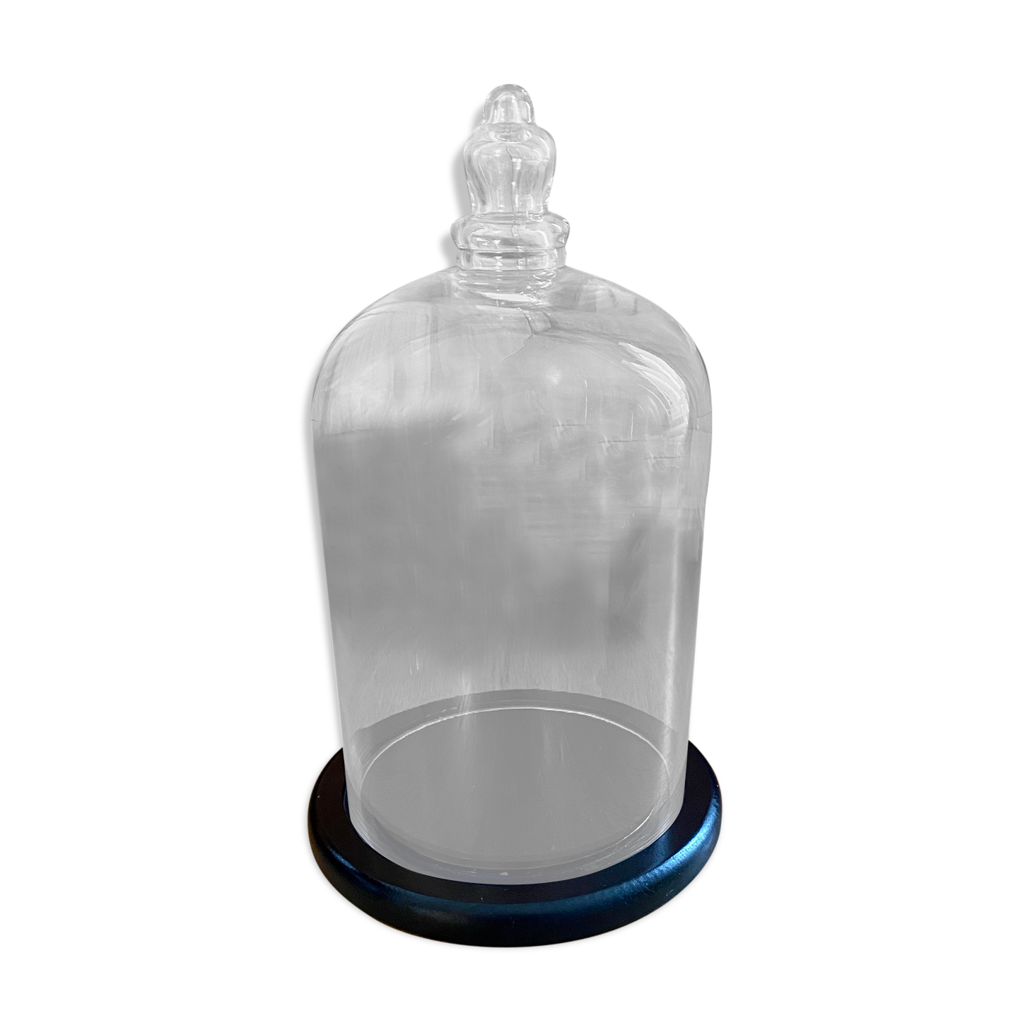 Large old glass bell and its wooden base