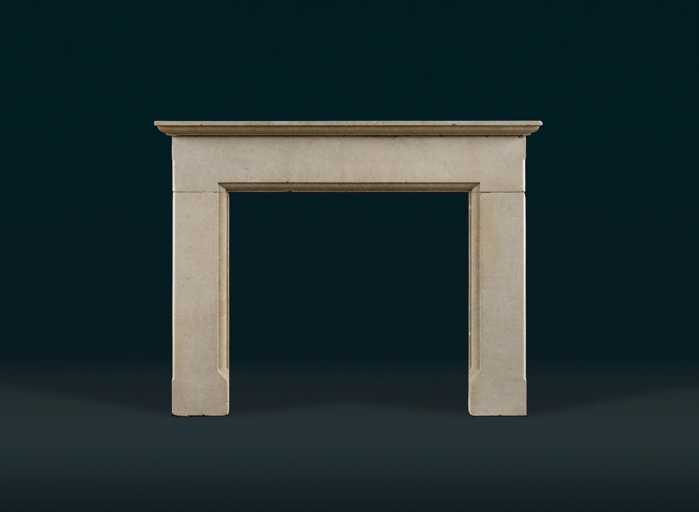 English Bath stone fireplace in the nineteenth century Gothic Revival style