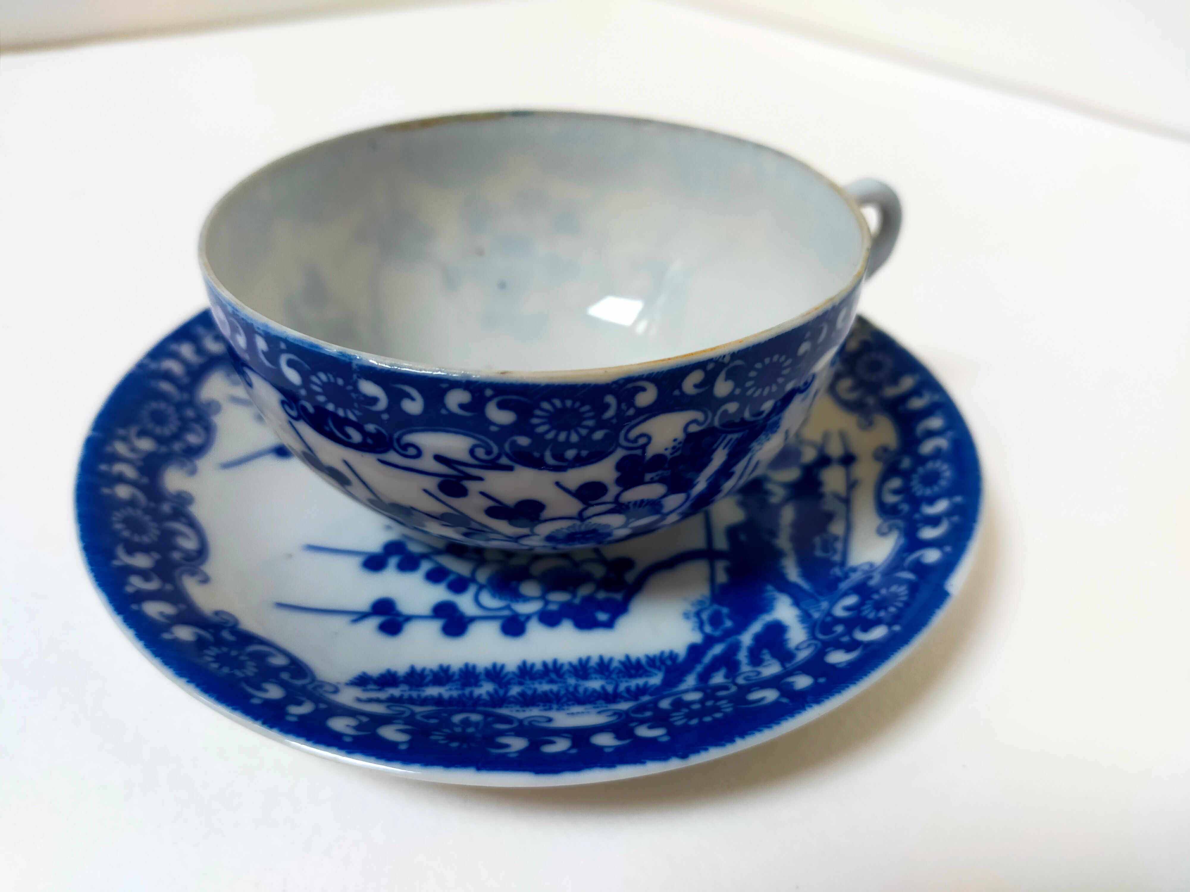 tea cup and Japanese saucer in blue and white porcelain