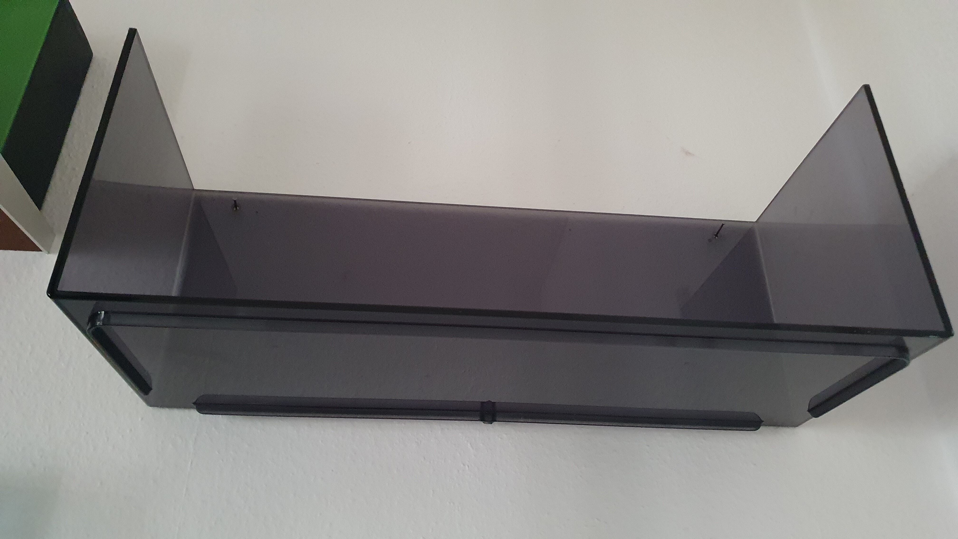 Plexiglas wall shelf