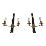 Pair of black lacquered bronze wall sconces decorated with lion heads