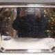 Silver-plated service tray with handles, neoclassical decoration.
