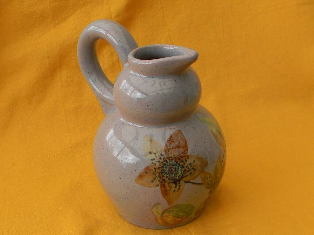 Ceramic pitcher by simone larrieu.