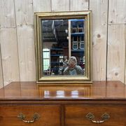 Miroir doré de style Louis XVI
