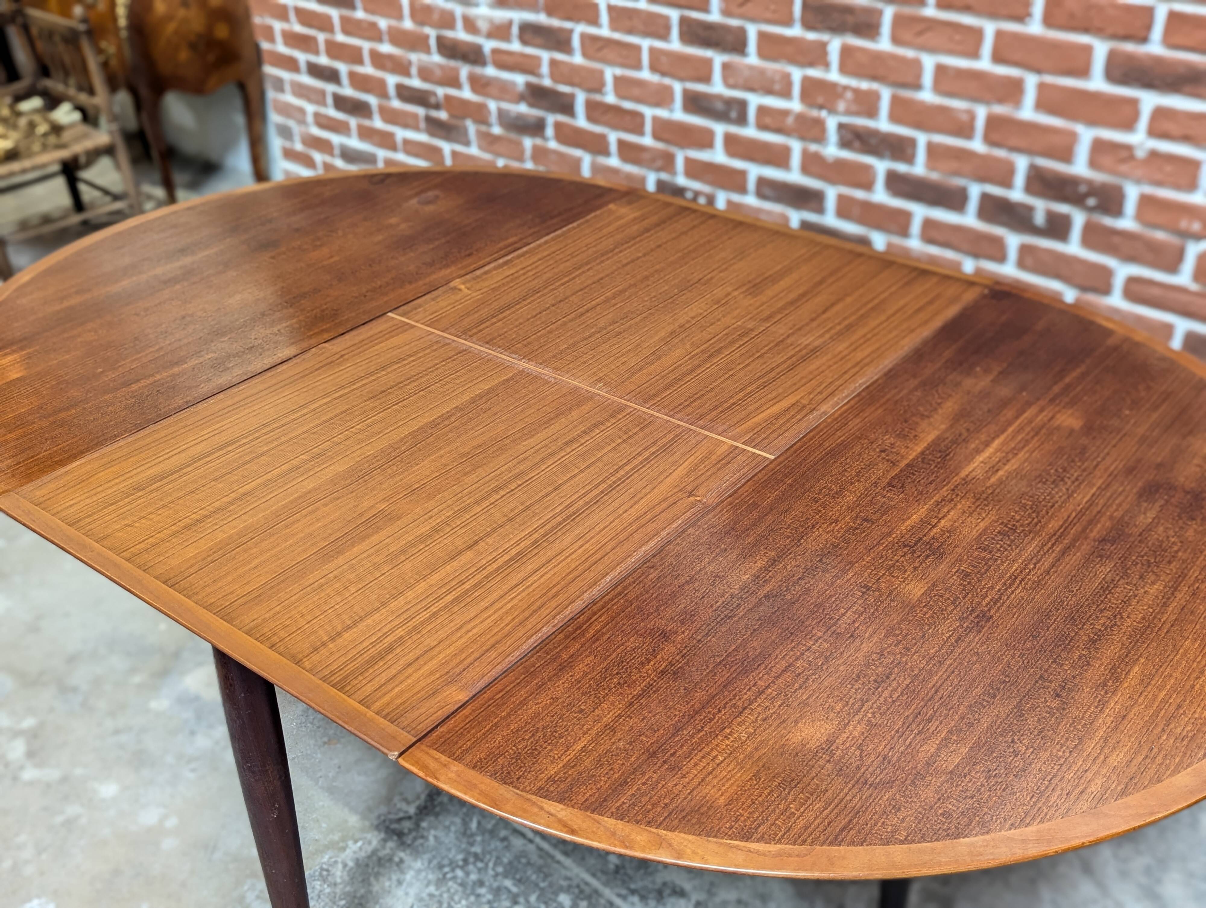 Round teak table from the 60s