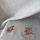 Nappe damassée, monogramme jf