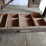 antique workbench with one drawer and two vices