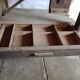 antique workbench with one drawer and two vices