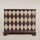 Pine chest of drawers from the 1940s with recent decorative paint.