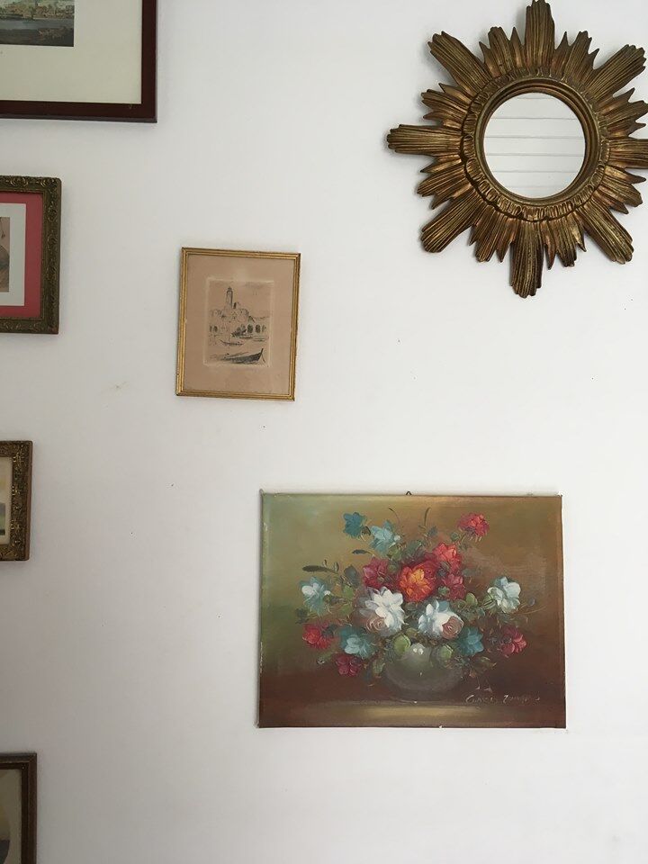 Painting still life bouquet of flowers in a vase.