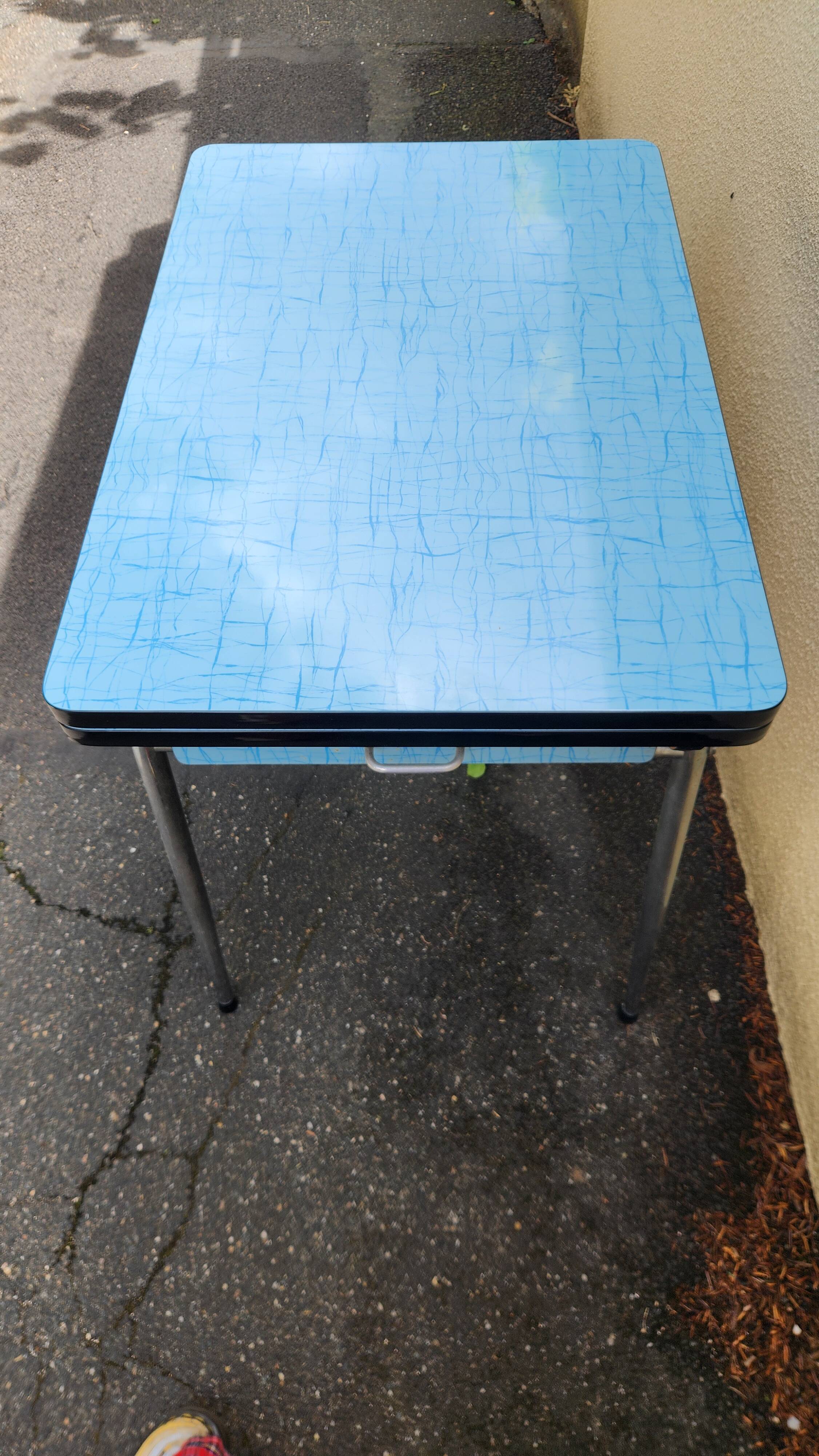 Vintage set from the 60s/70s: table, chairs, and marbled Formica stools.
