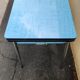 Vintage set from the 60s/70s: table, chairs, and marbled Formica stools.