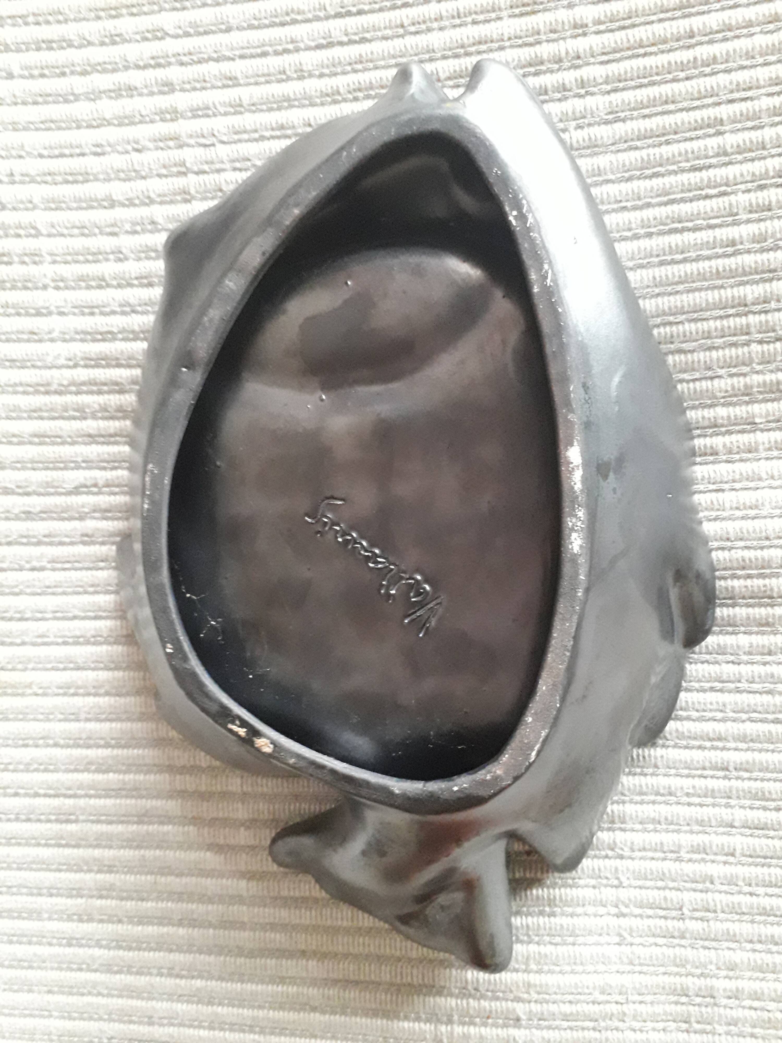 Vallauris fish-shaped pocket emptier