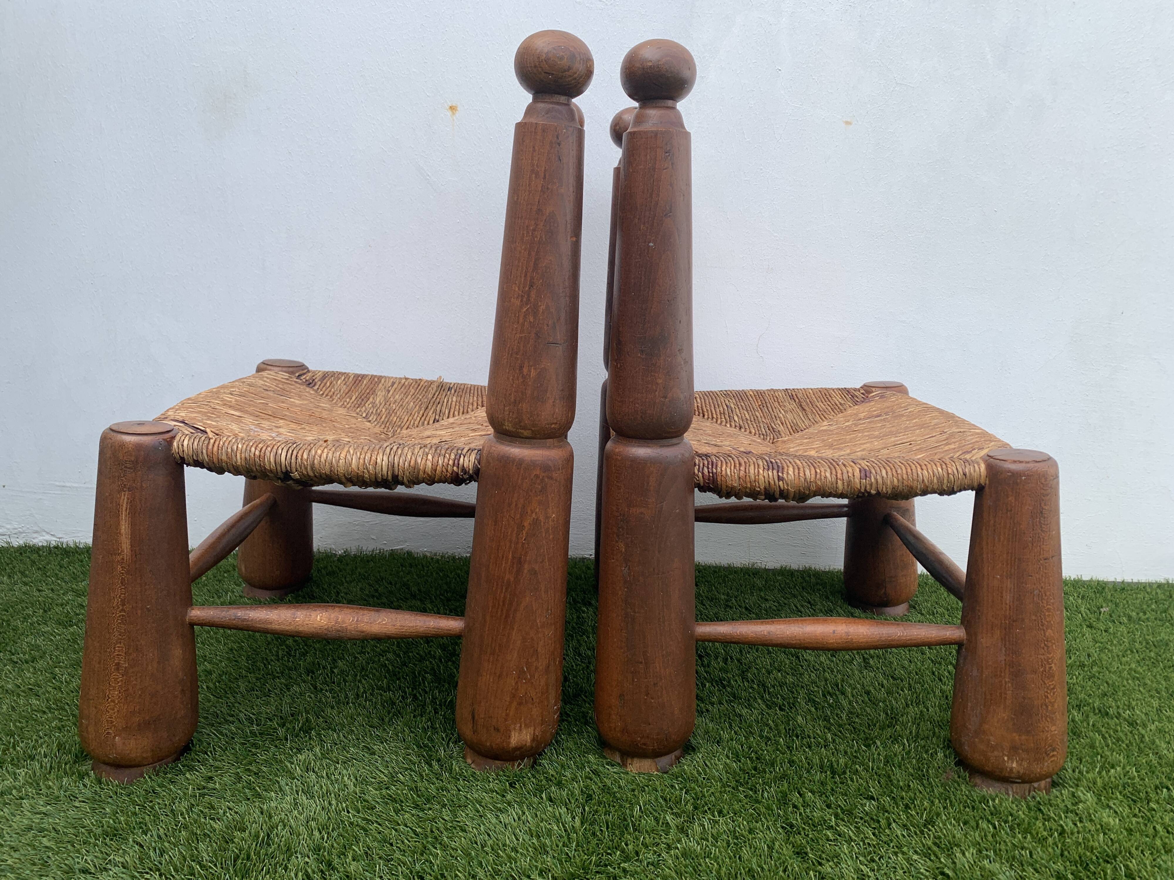 Pair of antique low fire chairs made of wood and straw